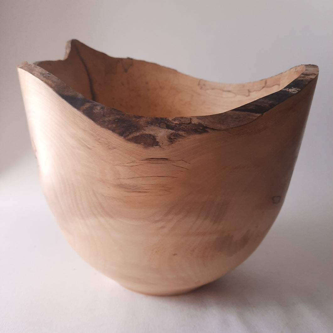Sycamore bowl with a hole