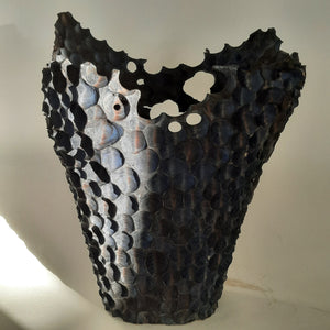 Tall textured blue vase